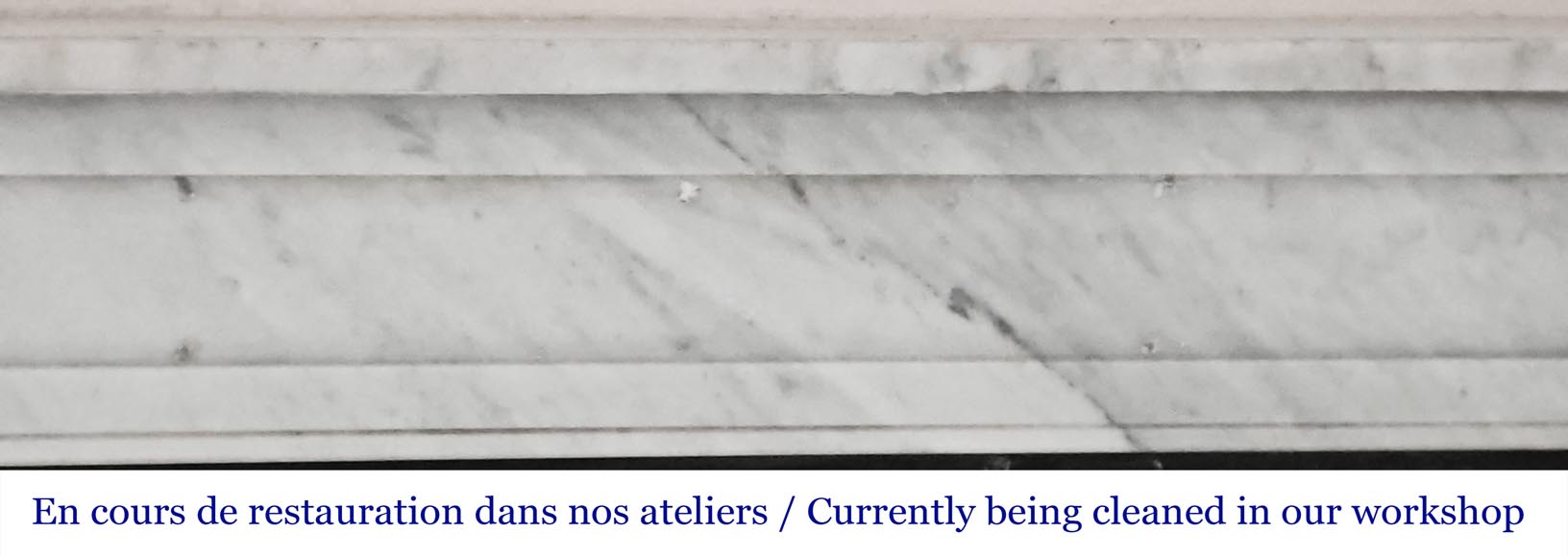 Louis XVI-style fireplace in Carrara marble, featuring molded ornamentation-1
