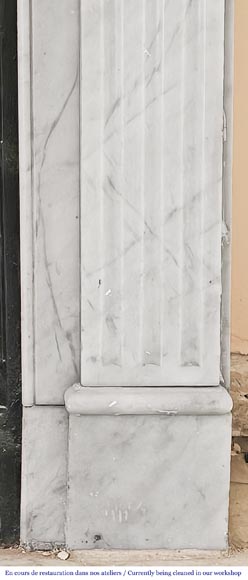 Louis XVI-style fireplace in Carrara marble, featuring molded ornamentation-7