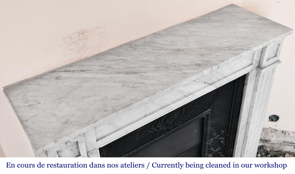 Louis XVI-style fireplace in Carrara marble, featuring molded ornamentation-9