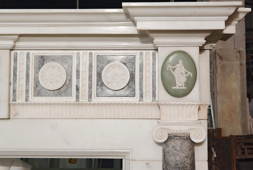 Victorian-style fireplace in statuary marble, featuring Ionic half-columns and a Wedgwood-style medallion decoration-12