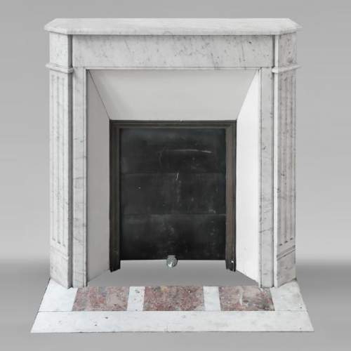 Louis XVI-style fireplace in Carrara marble