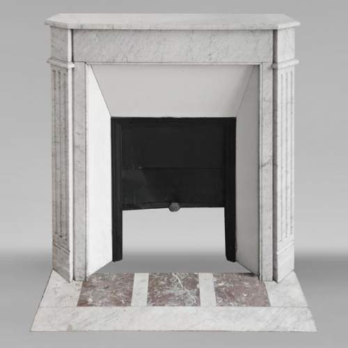 Louis XVI-style fireplace in Carrara marble